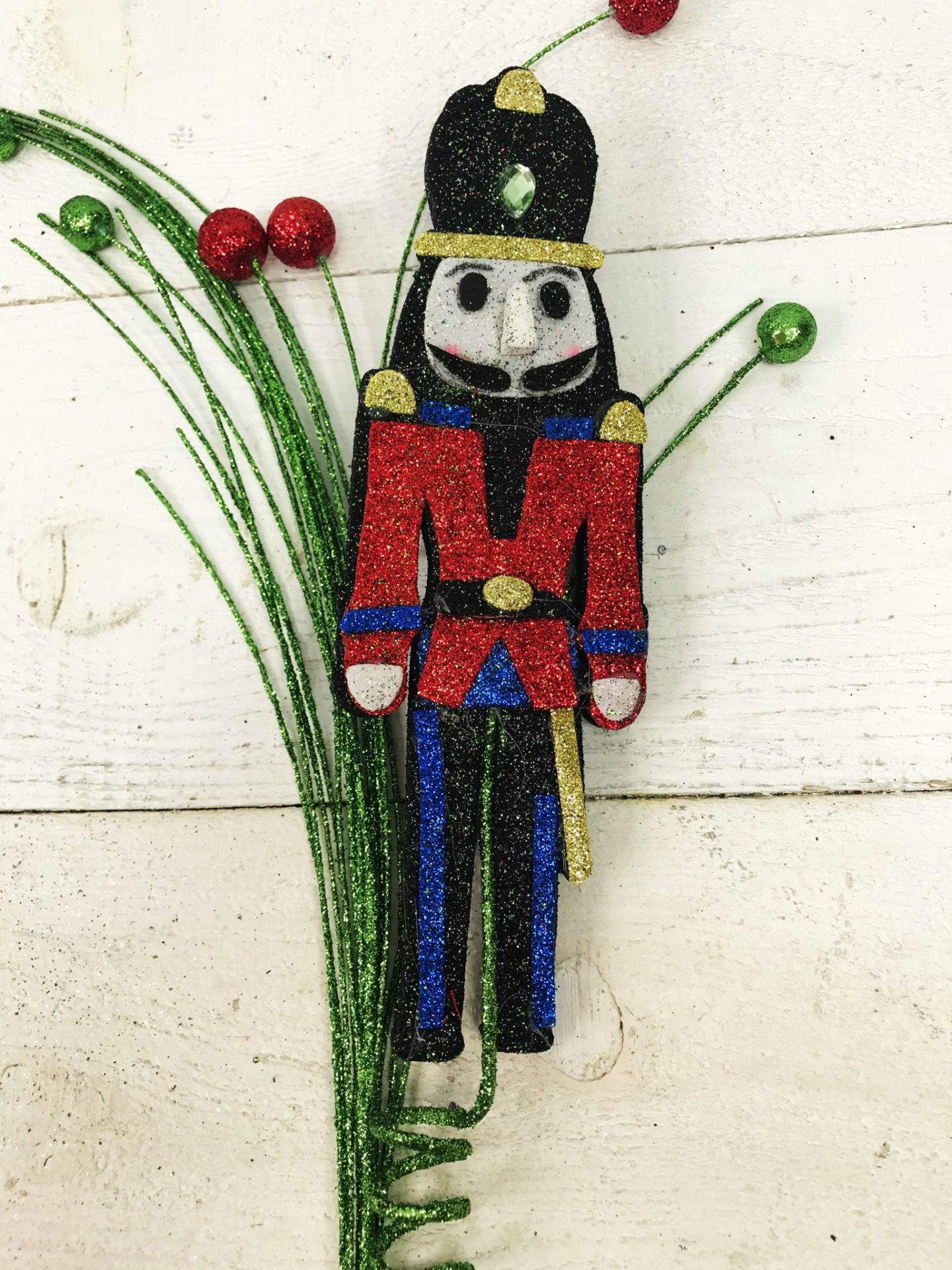 Nutcracker with grass and balls Pick Kelea's Florals