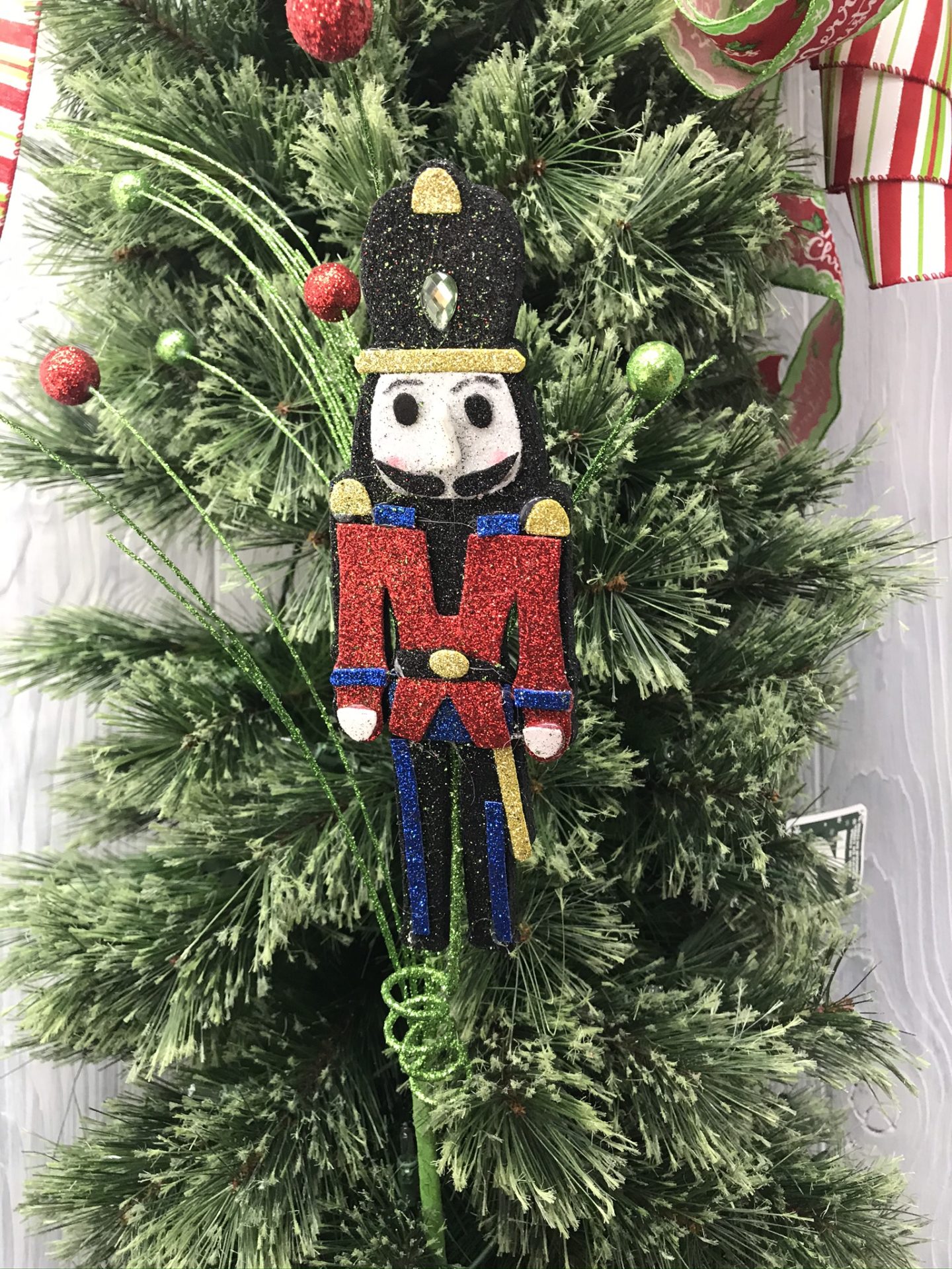 Nutcracker with grass and balls Pick Kelea's Florals