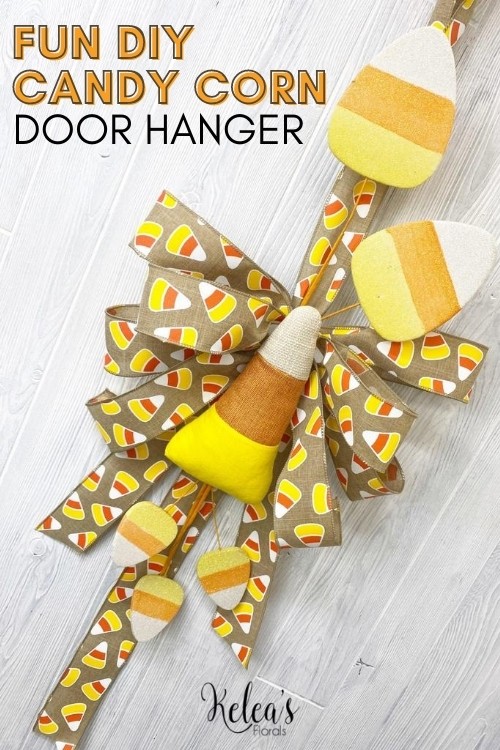 door hanger with candy corn attachments and ribbon