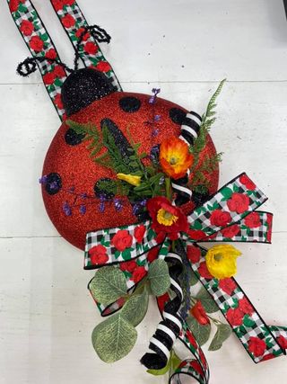Ladybug decorated door hanger