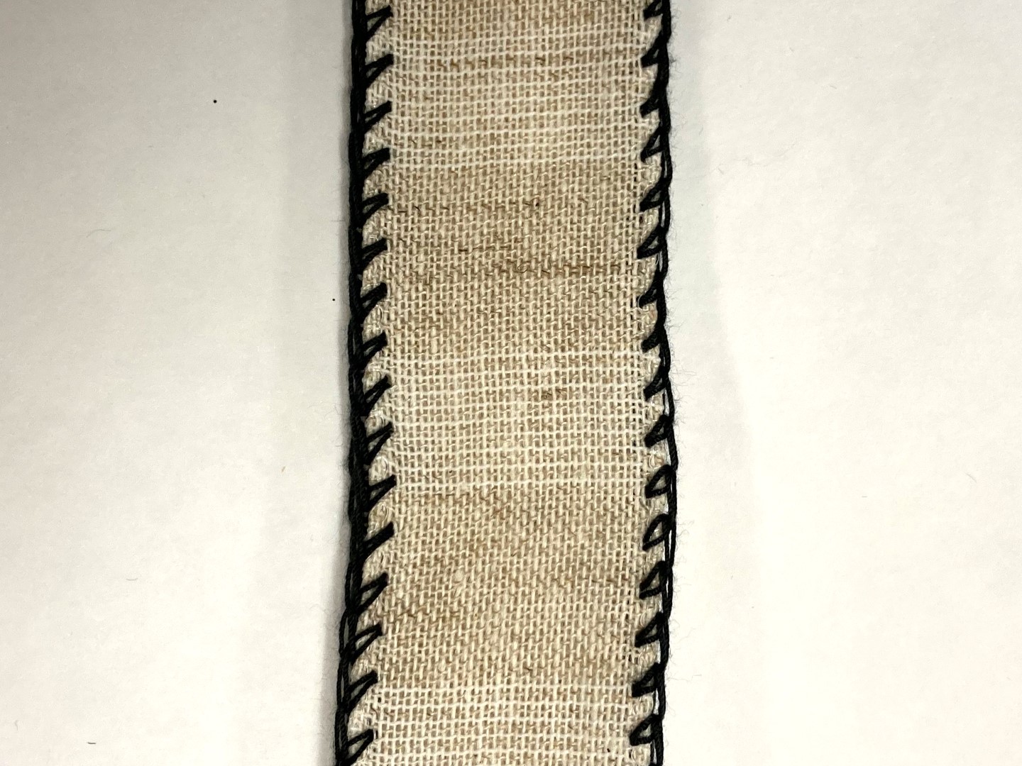 1.5" Ivory Canvas with Black Stitch Edge Ribbon on a 10 Yard Roll