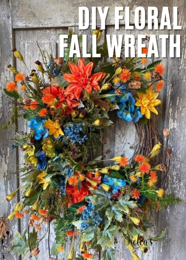 grapevine wreath with various flowers and greenery