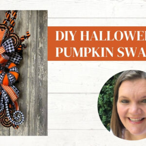 black swag with pumpkins and checkered ribbon