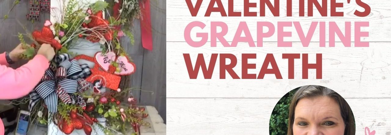 grapevine wreath with red glitter truck, hearts, and greenery