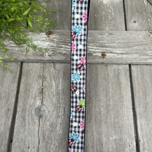 841-09-216 1.5" Black and White Gingham with Fuchsia Blue Lime Daisies and Ladybugs Wired Ribbon