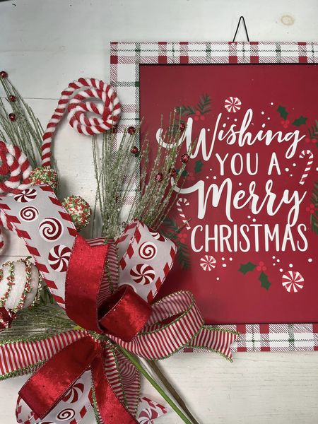 Wishing you a merry Christmas sign with holiday florals