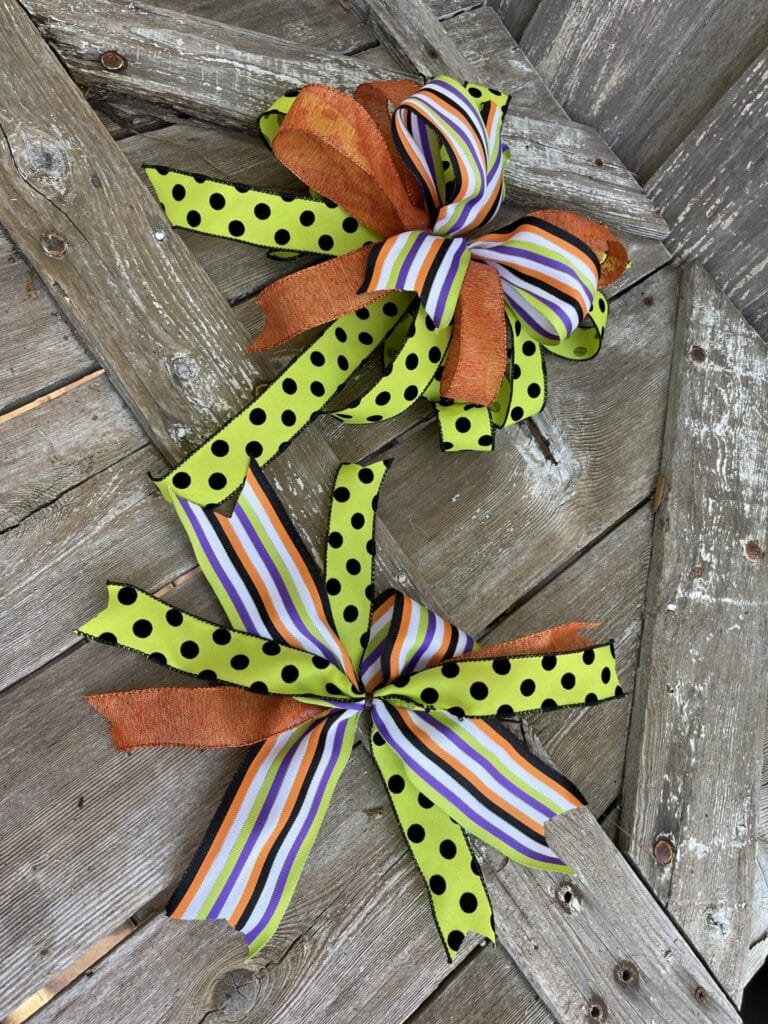 Orange green and striped Halloween ribbon bows for a colorful bat wreath