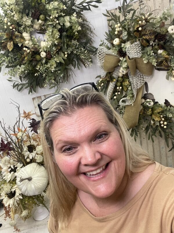 Kelea with Natural autumn decor collection with neutral pumpkin wreaths and candlestick design