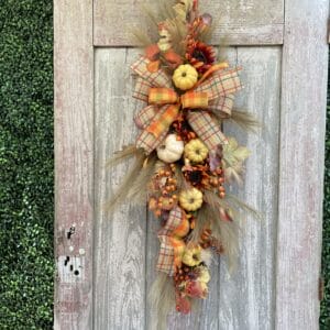 Fall pumpkin door swag with sunflowers, autumn plaid ribbon, berries and pumpkins